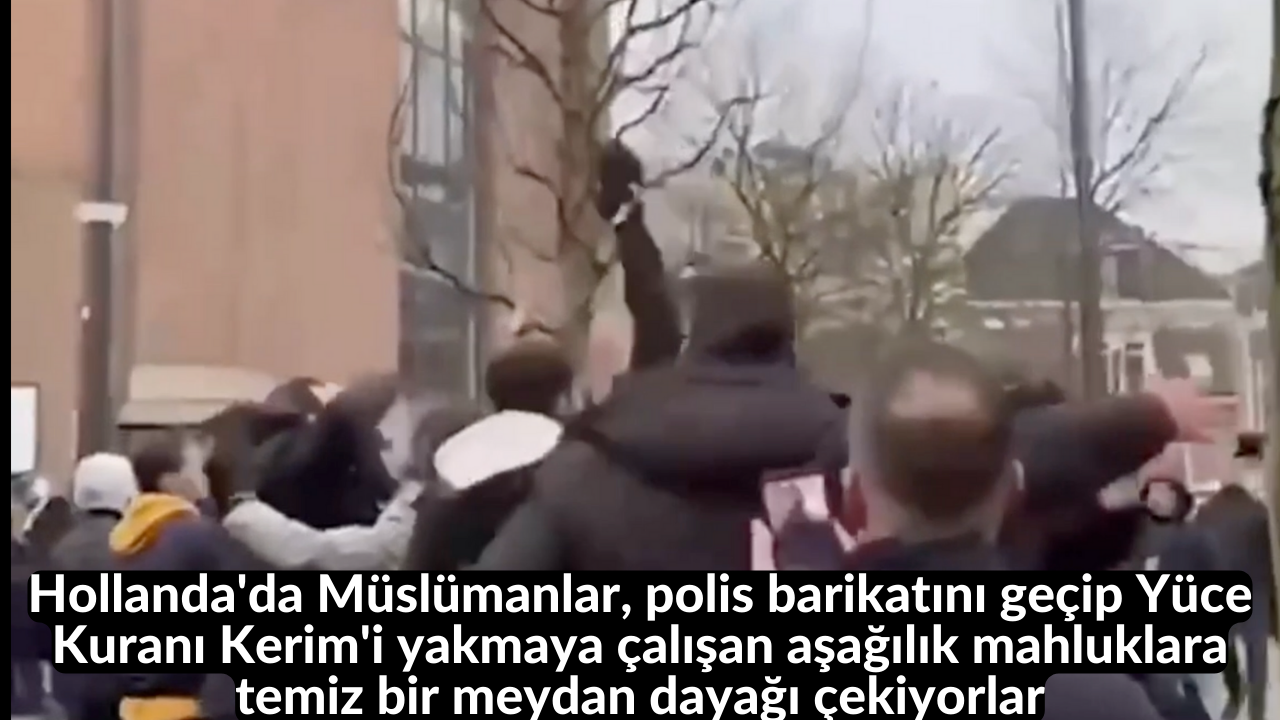 Hollanda'da Müslümanlar, polis barikatını geçip Yüce Kuranı Kerim'i yakmaya çalışan aşağılık mahluklara temiz bir meydan dayağı çekiyorlar 1