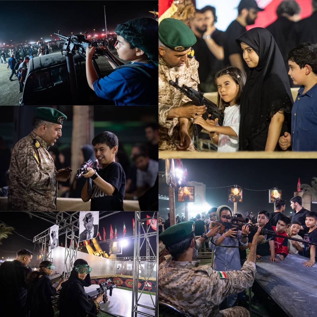 Tahran'daki Azadi Meydanı'nda çocuklara silahla atış eğitimi veriliyor.